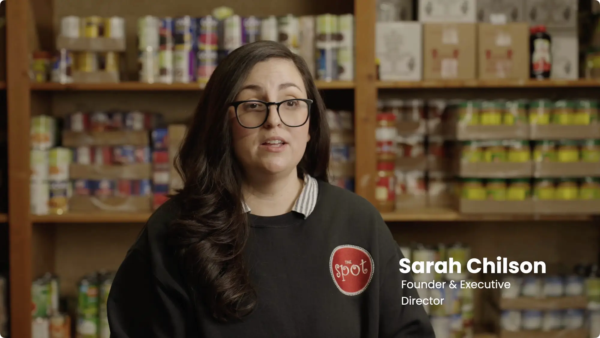 Sarah Chilson, Founder and Executive Director of The Spot, in the food pantry
